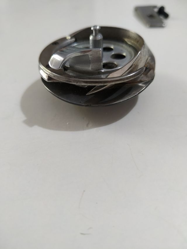 Garfio de bobina para máquina de coser