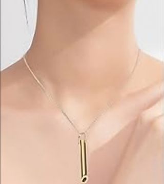 Collar antiestrés dorado