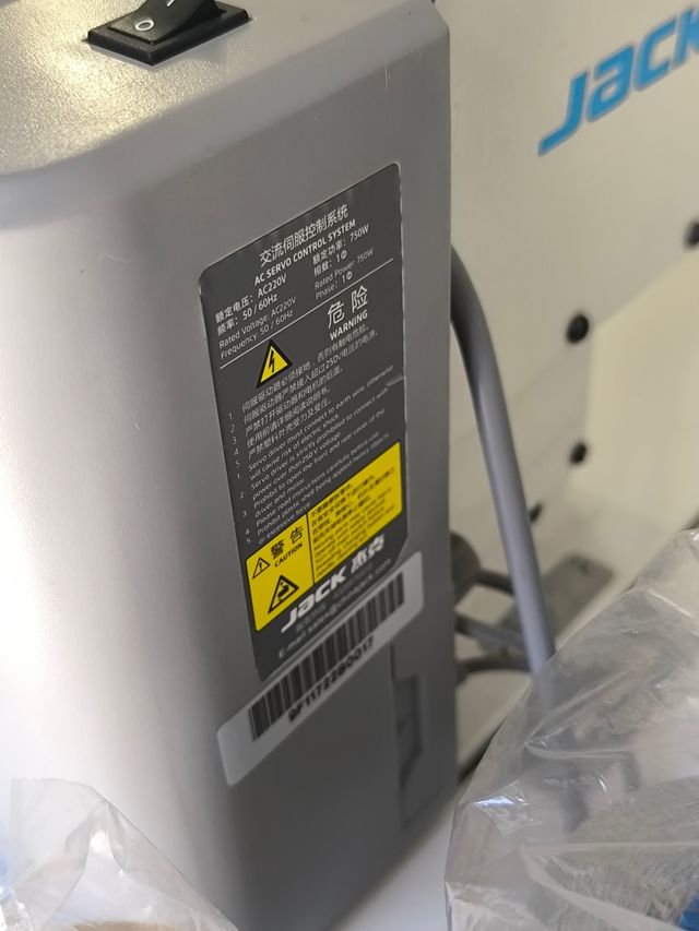 Máquina coser Jack industrial.