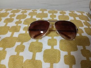 Gafas sol marrón dorado