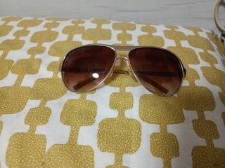 Gafas sol marrón dorado