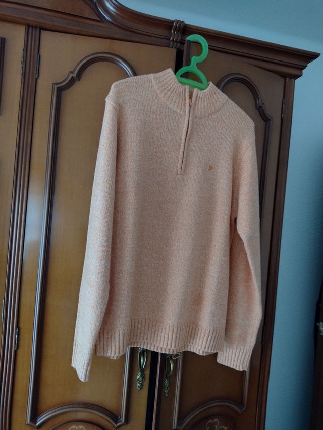 Jersey punto naranja, con cremallera en el cuello
