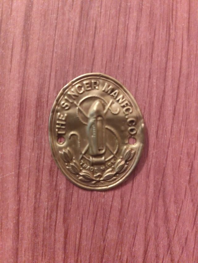 Chapa antigua Singer