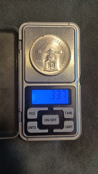 onzas Mexicanas balanza y guerrero