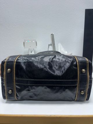 Bolso Carolina Herrera negro y dorado