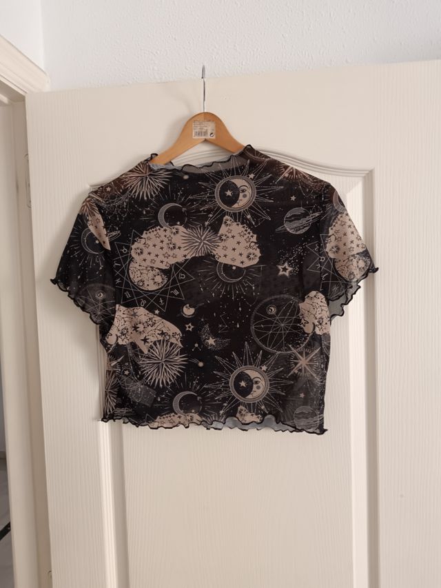 Blusa negra celeste corta