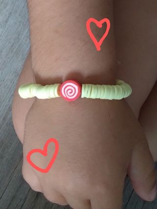 Pulsera infantil amarilla y roja