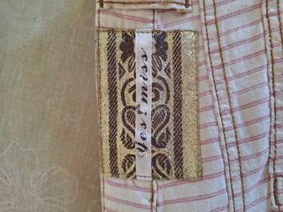 Pantaloni a righe bianco panna