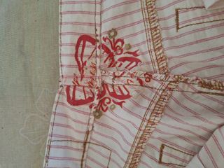 Pantaloni a righe bianco panna