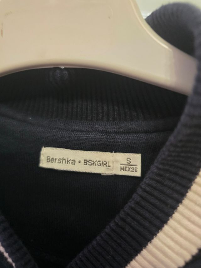 Cazadora universitaria azul