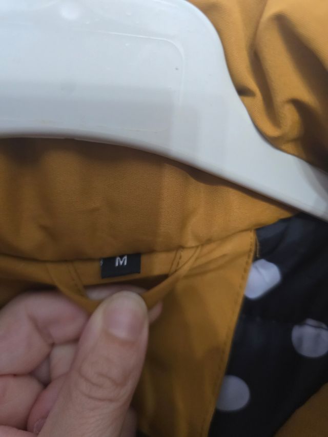 Cazadora plumas mostaza