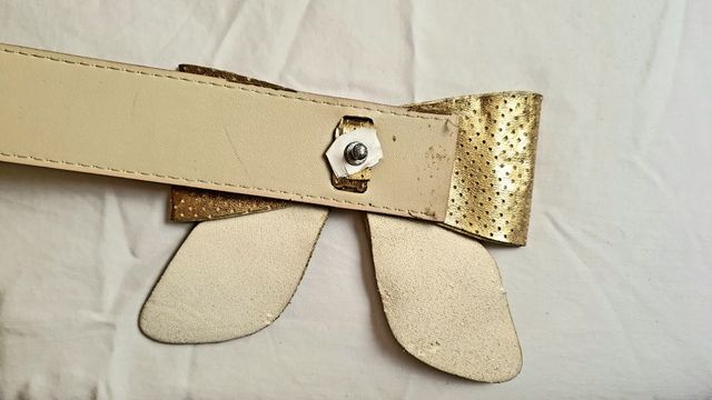 Cinturón lazo dorado