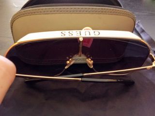 Gafas Guess doradas