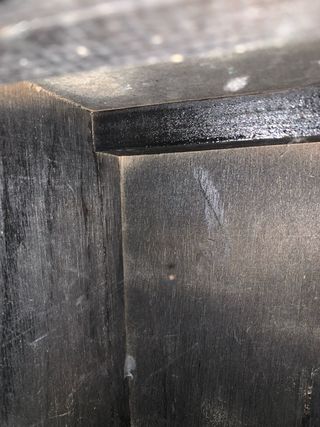 Armadietto in rattan e legno marrone