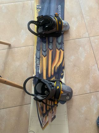 Tabla snowboard Quechua + fijaciones mide 1,48cm