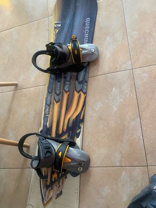 Tabla snowboard Quechua + fijaciones mide 1,48cm