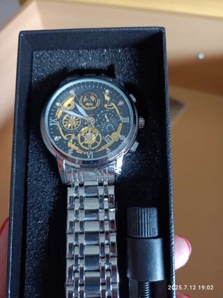 Reloj automático.