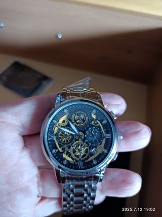 Reloj automático.