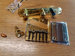 Placa puente Telecaster dorada
