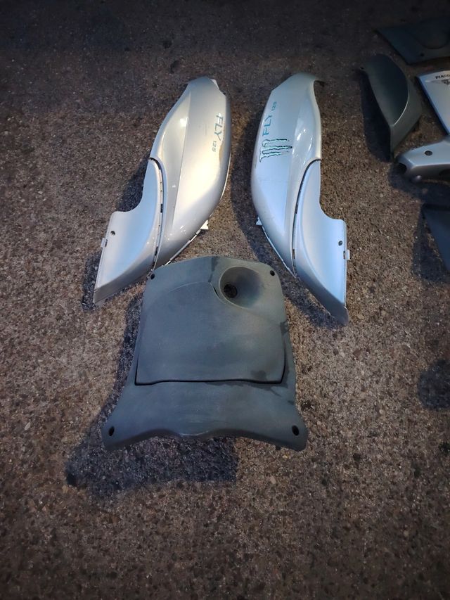 Tapas Piaggio Fly 125 (2004)