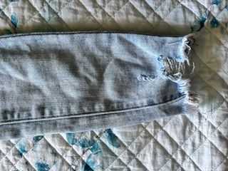 Jeans skinny strappati 40