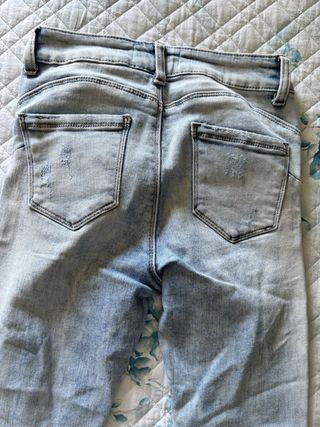 Jeans skinny strappati 40