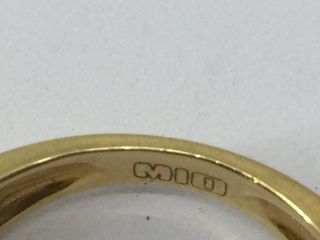 alianza oro 18k con piedra con diamante
