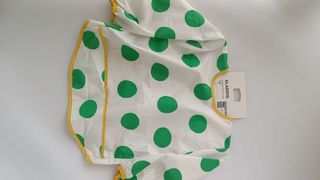 Babero, cambiador y taza infantil
