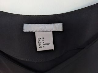 Blusa negra off-shoulder T38