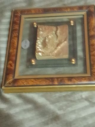 Quadri a rilievo in metallo e legno