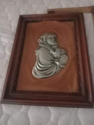 Quadri a rilievo in metallo e legno
