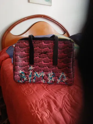 Bolso bandolera rosa y negro