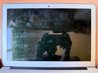 MacBook Air + charger (2015)