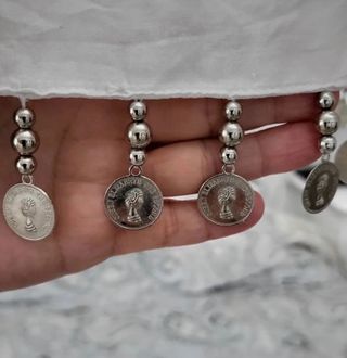 Chaleco blanco abalorios.