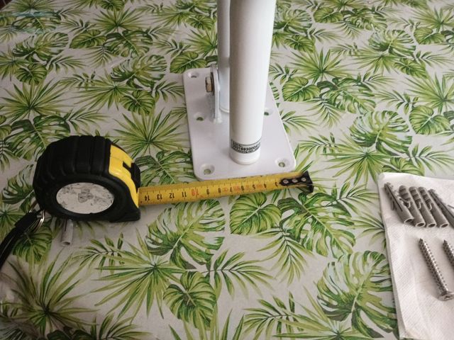 Barra abatible blanca para baño