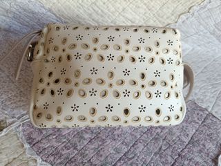 Bolso Robert Pietri blanco y rosa con flores