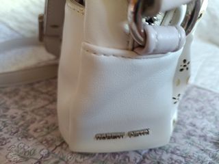 Bolso Robert Pietri blanco y rosa con flores