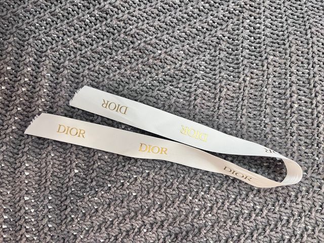 Dior labiales + postal + bolsa