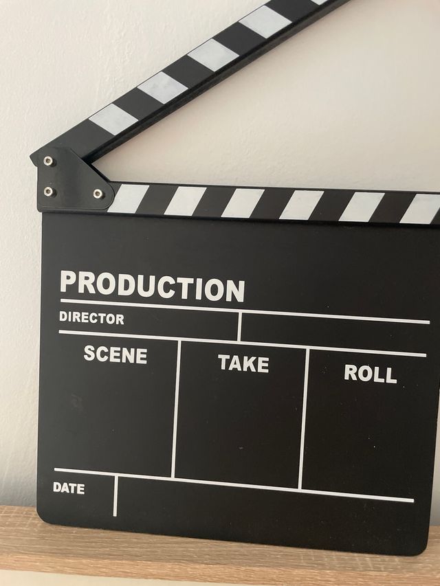 claqueta + Cartel luminoso 'HOME'