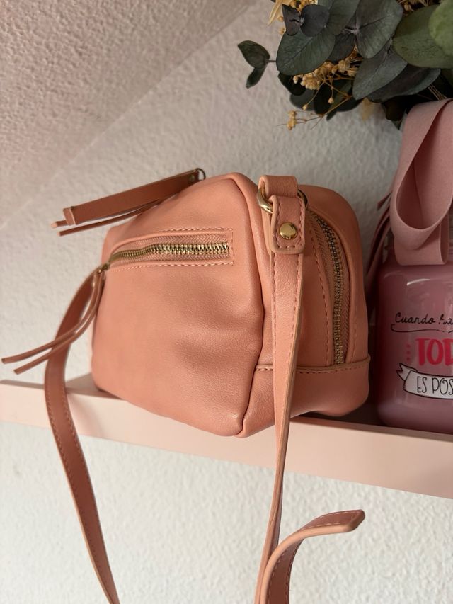 Bolso bandolera rosa claro