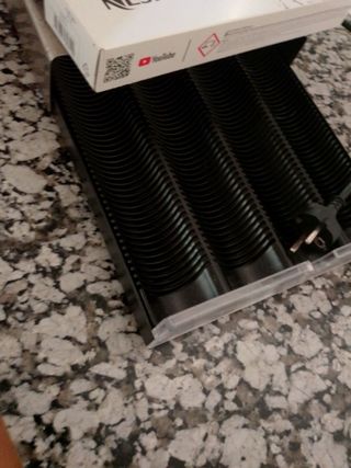 Cafetera Nespresso + Portacapsulas