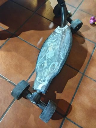 Patinete Oxelo 4 ruedas usado
