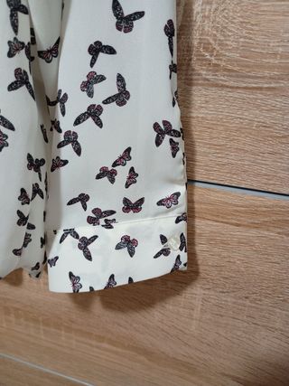 Blusa manga larga estampada 
