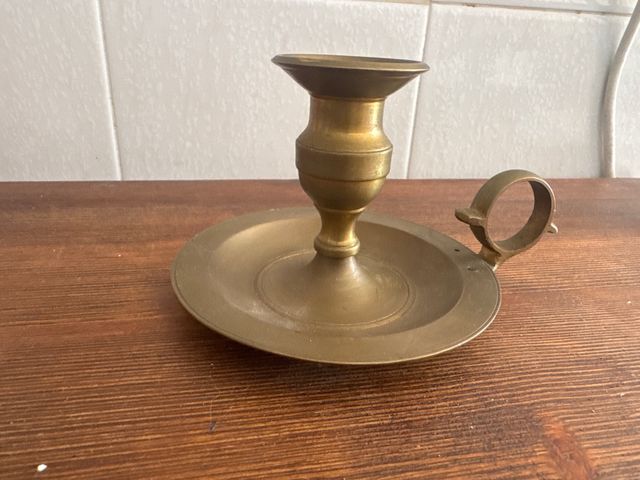 Candeliere in bronzo antico