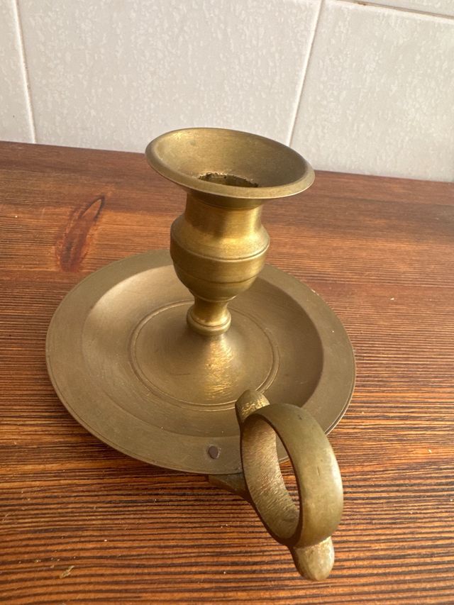 Candeliere in bronzo antico