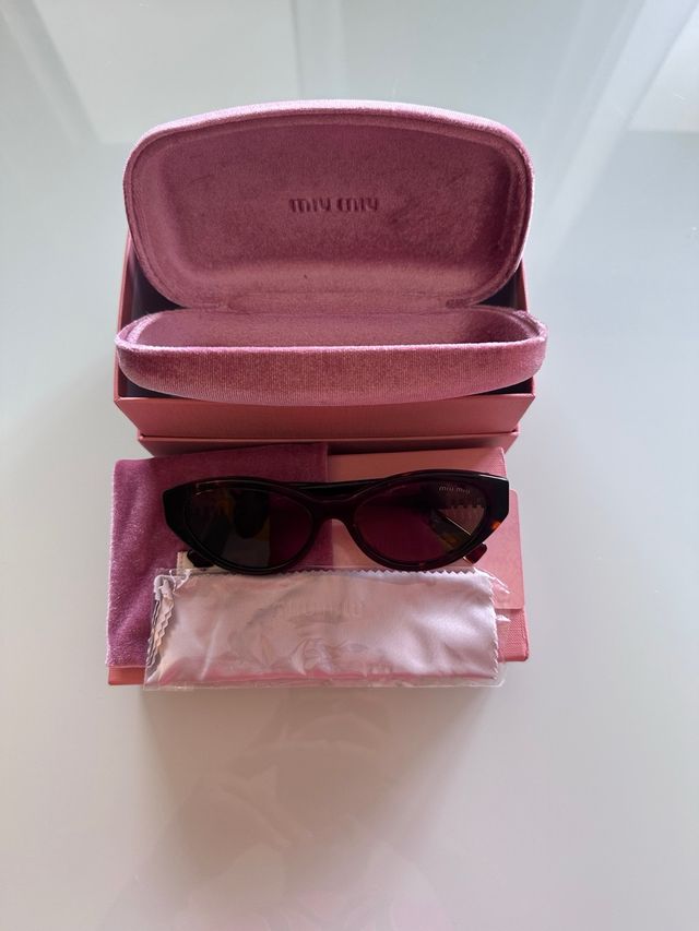 Occhiali Miu Miu MUA04S Marroni