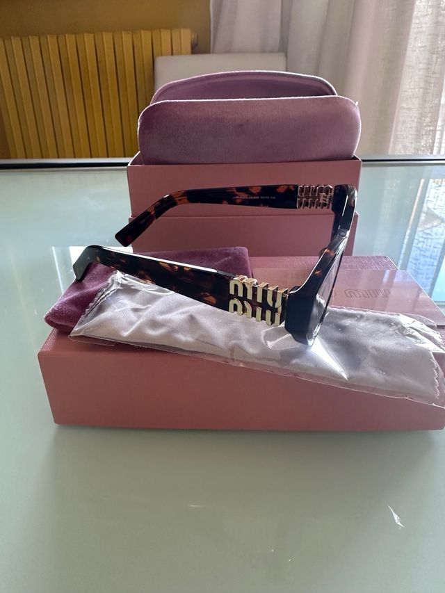 Occhiali Miu Miu MUA04S Marroni