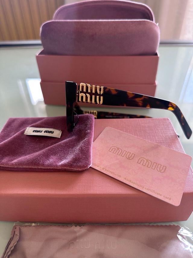 Occhiali Miu Miu MUA04S Marroni