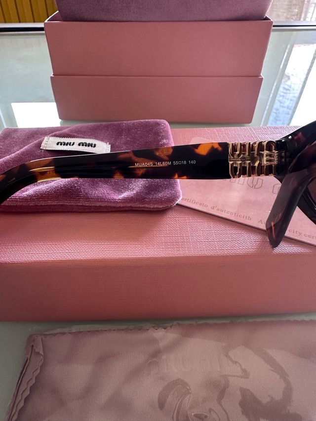 Occhiali Miu Miu MUA04S Marroni