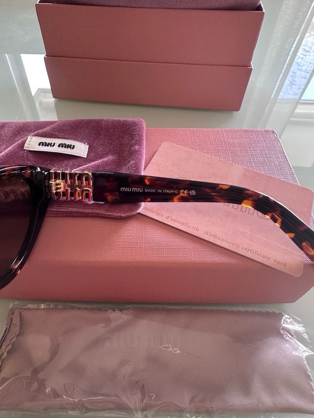 Occhiali Miu Miu MUA04S Marroni